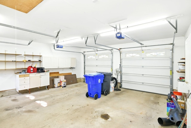 3 Birchwood Ter, Enfield, CT 06082 - garage featuring a garage door opener
