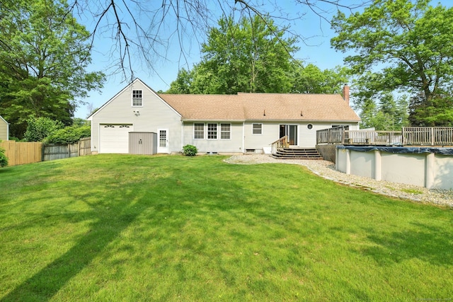 3 Birchwood Ter, Enfield, CT 06082 - back of property featuring a chimney, a wooden deck, and a shingled roof