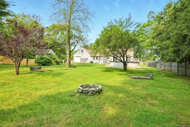 3 Birchwood Ter, Enfield, CT 06082 - view of yard featuring a fire pit