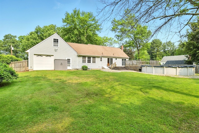 3 Birchwood Ter, Enfield, CT 06082 - rear view of house featuring a wooden deck, a chimney, a covered pool, and driveway