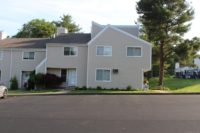 9 Watch Hill Cir Unit 9, Cromwell, CT 06416 - townhome / multi-family property featuring a chimney, entry steps, and a front lawn