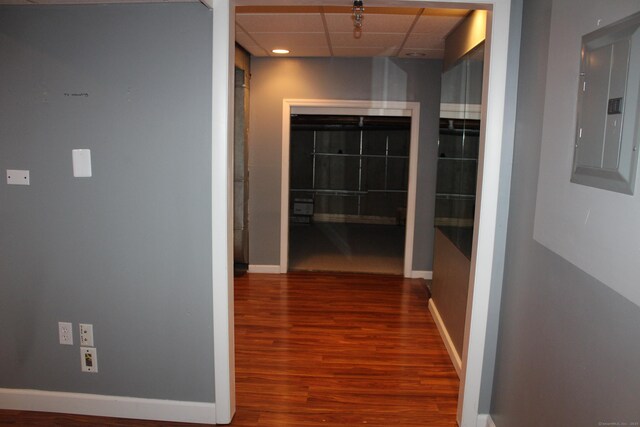 9 Watch Hill Cir Unit 9, Cromwell, CT 06416 - hallway with electric panel, wood finished floors, a paneled ceiling, and baseboards