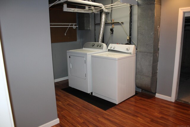 9 Watch Hill Cir Unit 9, Cromwell, CT 06416 - laundry area featuring washing machine and dryer, wood finished floors, and baseboards