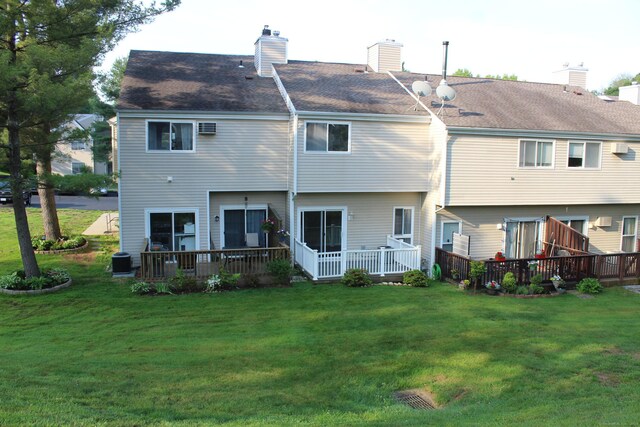 9 Watch Hill Cir Unit 9, Cromwell, CT 06416 - rear view of property with a wooden deck, a yard, and a chimney