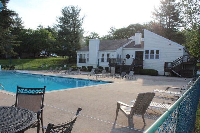 9 Watch Hill Cir Unit 9, Cromwell, CT 06416 - community pool with stairway, a patio, and a wooden deck