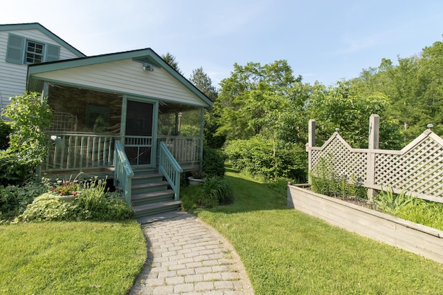 884 Black Rock Tpke, Easton, CT 06612 - view of front of house with a front lawn and a sunroom