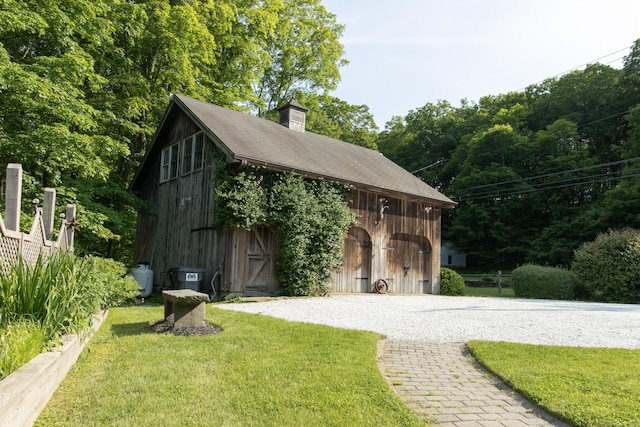 884 Black Rock Tpke, Easton, CT 06612 - view of barn featuring a lawn and driveway