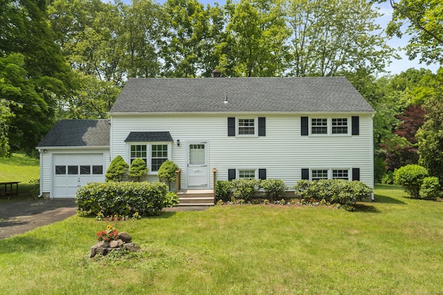 115 Earl Ave, Hamden, CT 06514 - view of front of property featuring an attached garage, a front yard, driveway, and roof with shingles