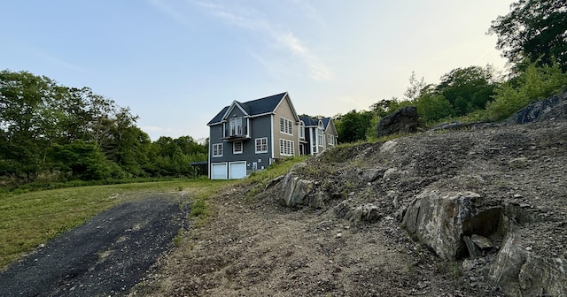 40 Bee Mountain Rd, Oxford, CT 06478 - view of side of home with driveway and an attached garage