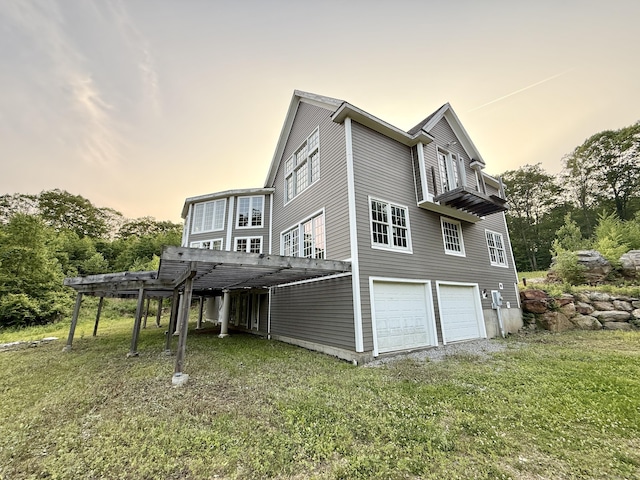 40 Bee Mountain Rd, Oxford, CT 06478 - property exterior at dusk featuring an attached garage and a yard