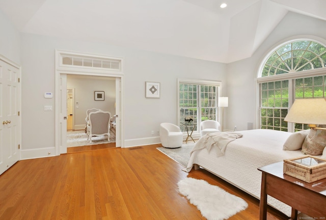 19 Father Peters Ln, New Canaan, CT 06840 - bedroom featuring light wood finished floors and high vaulted ceiling