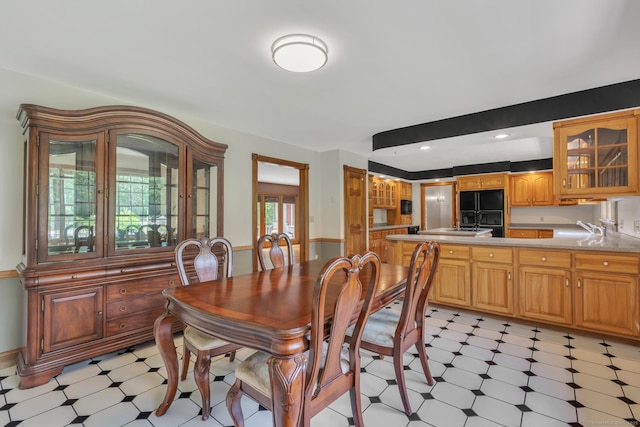 192 Palmer Rd, Chaplin, CT 06235 - dining area featuring light floors and wainscoting