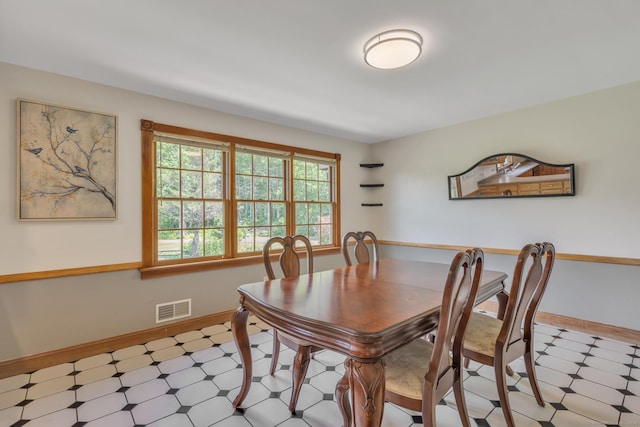 192 Palmer Rd, Chaplin, CT 06235 - dining room with tile patterned floors and baseboards