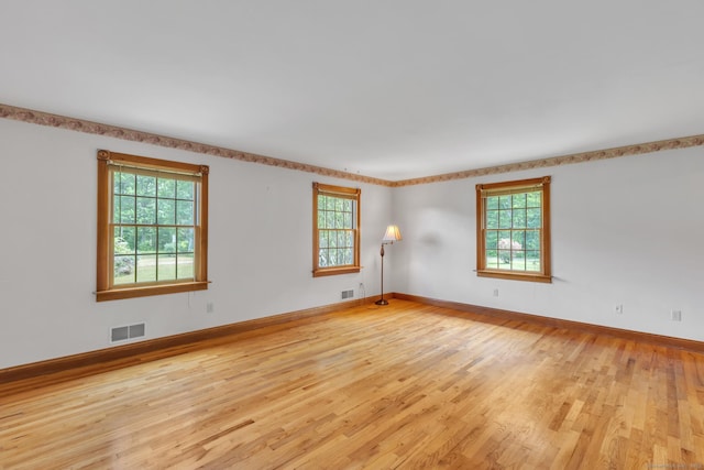 192 Palmer Rd, Chaplin, CT 06235 - empty room with light wood finished floors and plenty of natural light