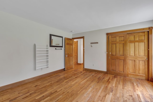 192 Palmer Rd, Chaplin, CT 06235 - unfurnished bedroom with light wood finished floors and baseboards