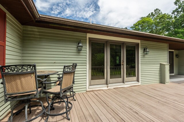 192 Palmer Rd, Chaplin, CT 06235 - wooden deck with outdoor dining space