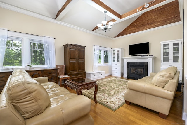 10 Dry Hill Ct, Norwalk, CT 06851 - living room featuring a chandelier, plenty of natural light, beamed ceiling, light wood-style floors, and a tiled fireplace