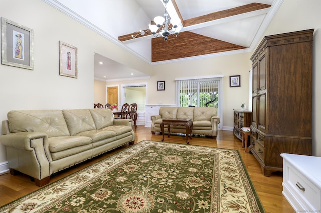 10 Dry Hill Ct, Norwalk, CT 06851 - living area with a chandelier, light wood-style floors, high vaulted ceiling, crown molding, and beamed ceiling
