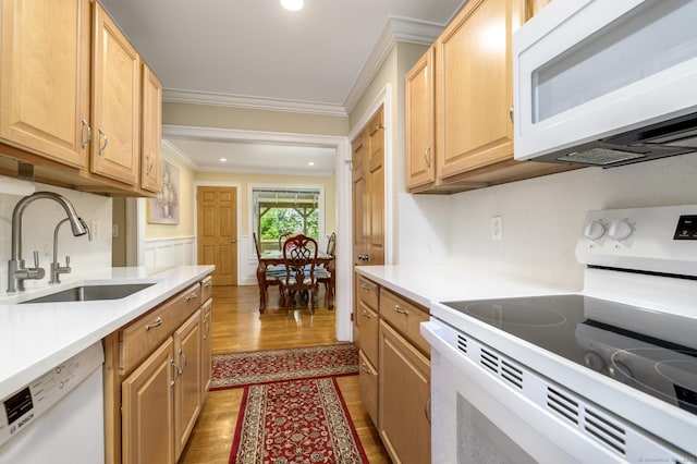 10 Dry Hill Ct, Norwalk, CT 06851 - kitchen featuring white appliances, a sink, ornamental molding, light wood-style floors, and light countertops