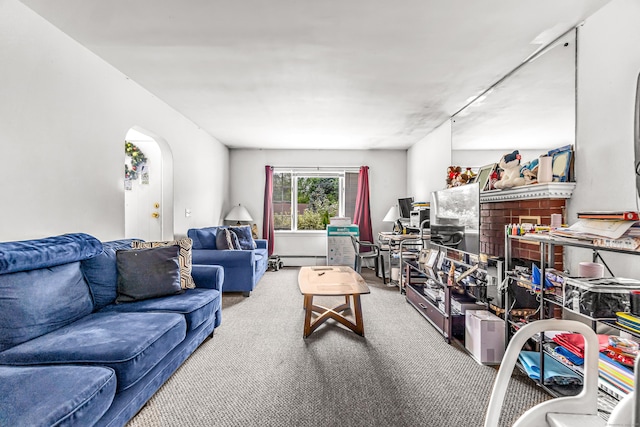 214 Thames St, New London, CT 06320 - living room featuring carpet, baseboard heating, and arched walkways