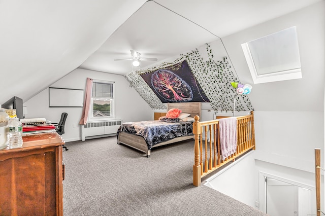 214 Thames St, New London, CT 06320 - carpeted bedroom with radiator, vaulted ceiling, a skylight, and ceiling fan