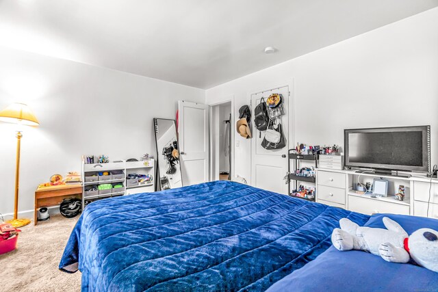 214 Thames St, New London, CT 06320 - carpeted bedroom with baseboards