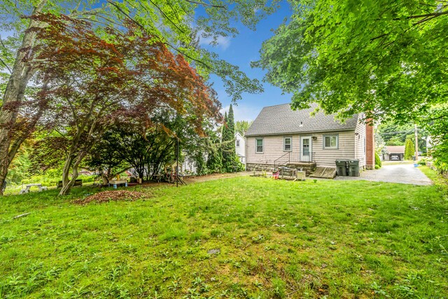 214 Thames St, New London, CT 06320 - view of green lawn with a patio area