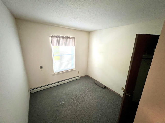 415 E Mitchell Ave Unit 415, Cheshire, CT 06410 - empty room with a baseboard heating unit, carpet floors, and a textured ceiling