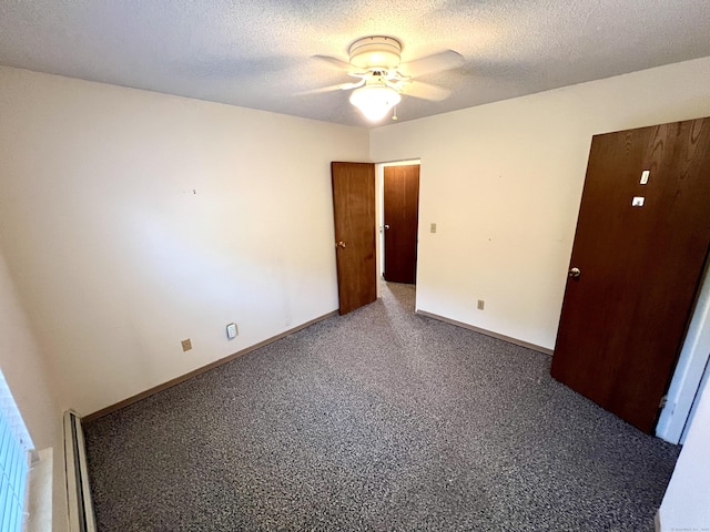 415 E Mitchell Ave Unit 415, Cheshire, CT 06410 - unfurnished bedroom with carpet flooring, a textured ceiling, ceiling fan, and baseboards