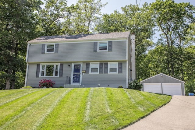 158 Jones Dr, New Britain, CT 06053 - colonial inspired home with an outdoor structure, a detached garage, a front lawn, and a chimney