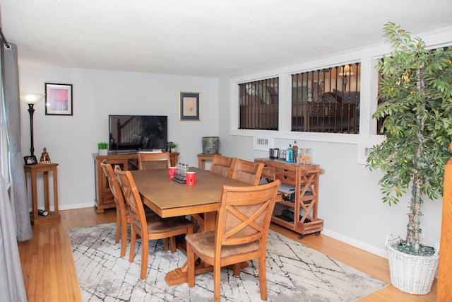 158 Jones Dr, New Britain, CT 06053 - dining room with light wood-style floors and baseboards