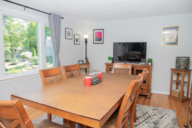 158 Jones Dr, New Britain, CT 06053 - dining area featuring light wood-type flooring and baseboards