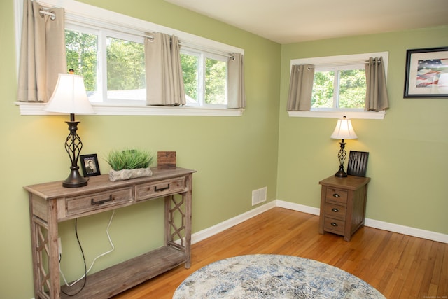 158 Jones Dr, New Britain, CT 06053 - sitting room featuring wood finished floors, plenty of natural light, and baseboards
