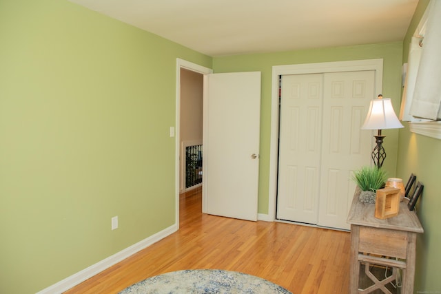 158 Jones Dr, New Britain, CT 06053 - bedroom featuring wood finished floors, a closet, and baseboards