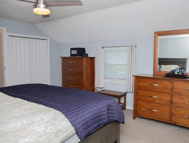 158 Jones Dr, New Britain, CT 06053 - bedroom featuring light carpet, vaulted ceiling, a closet, a ceiling fan, and baseboards