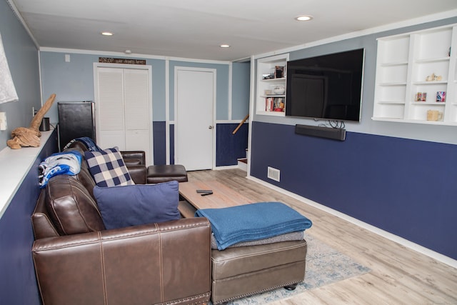 158 Jones Dr, New Britain, CT 06053 - living area with wood finished floors, stairway, recessed lighting, built in features, and baseboards
