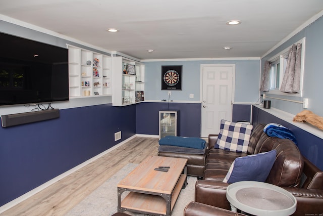 158 Jones Dr, New Britain, CT 06053 - living room featuring wood finished floors, crown molding, and recessed lighting