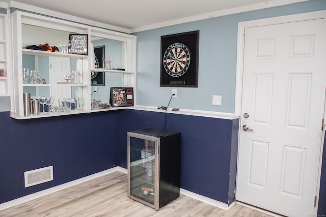 158 Jones Dr, New Britain, CT 06053 - indoor dry bar featuring wine cooler and wood finished floors