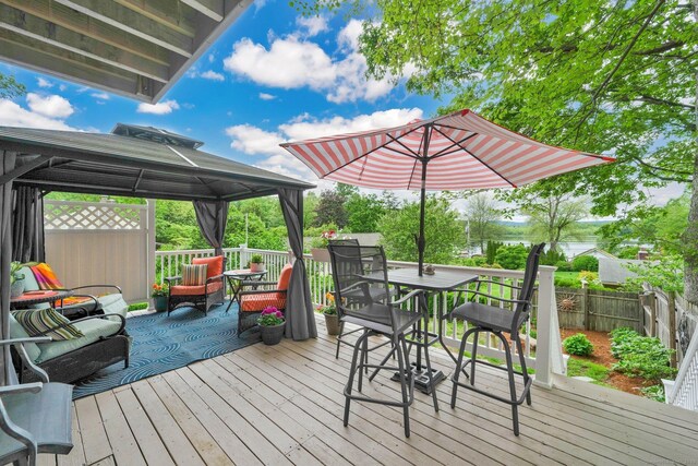 61 Pine Rd, Suffield, CT 06093 - deck featuring a gazebo, outdoor dining space, and an outdoor hangout area