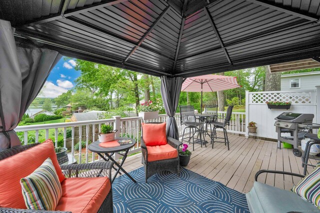 61 Pine Rd, Suffield, CT 06093 - wooden deck featuring a grill, outdoor dining space, and a gazebo