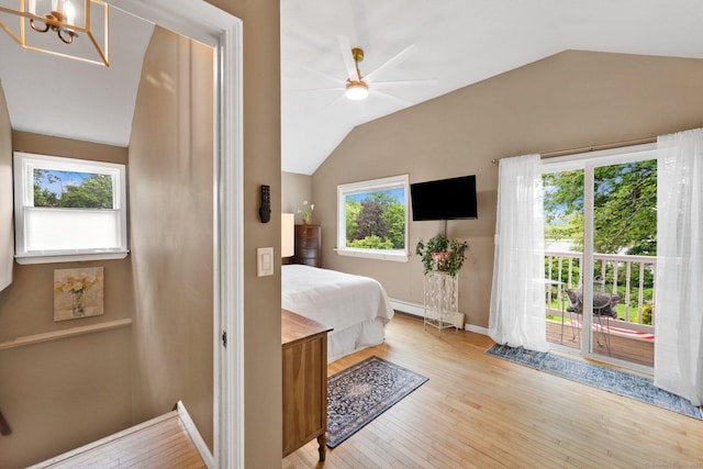 61 Pine Rd, Suffield, CT 06093 - bedroom with vaulted ceiling, access to outside, wood finished floors, a baseboard heating unit, and a chandelier