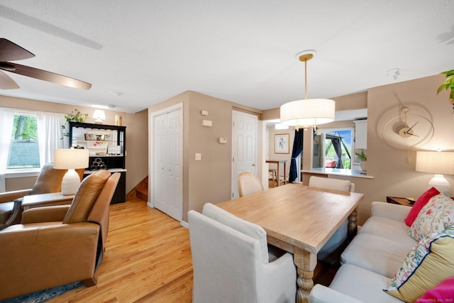 61 Pine Rd, Suffield, CT 06093 - dining area with ceiling fan, light wood-style flooring, and baseboards