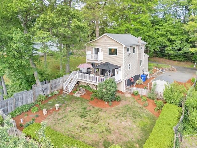 61 Pine Rd, Suffield, CT 06093 - back of house with a wooden deck, a fenced backyard, stairway, a gazebo, and a chimney