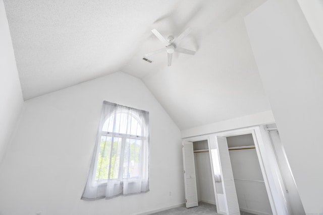 601 Whetstone Mls Unit 601, Killingly, CT 06241 - unfurnished bedroom featuring lofted ceiling, ceiling fan, and a closet