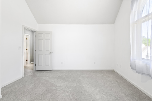 601 Whetstone Mls Unit 601, Killingly, CT 06241 - carpeted empty room with lofted ceiling, plenty of natural light, and baseboards