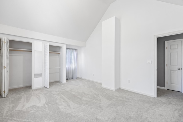 601 Whetstone Mls Unit 601, Killingly, CT 06241 - unfurnished bedroom with carpet, high vaulted ceiling, and baseboards
