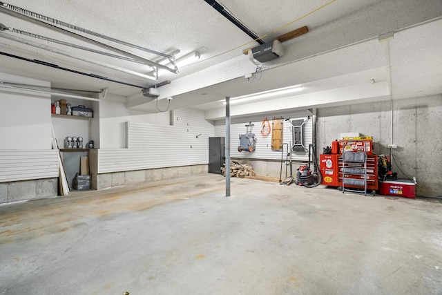 601 Whetstone Mls Unit 601, Killingly, CT 06241 - garage featuring a garage door opener