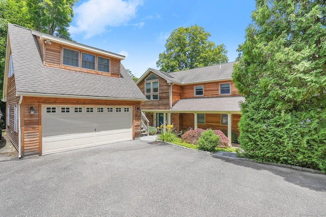 35 Knollcrest Rd, New Fairfield, CT 06812 - chalet / cabin with driveway and an attached garage