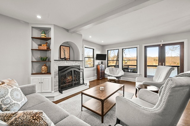 35 Knollcrest Rd, New Fairfield, CT 06812 - living room with a lit fireplace, recessed lighting, wood finished floors, and baseboards