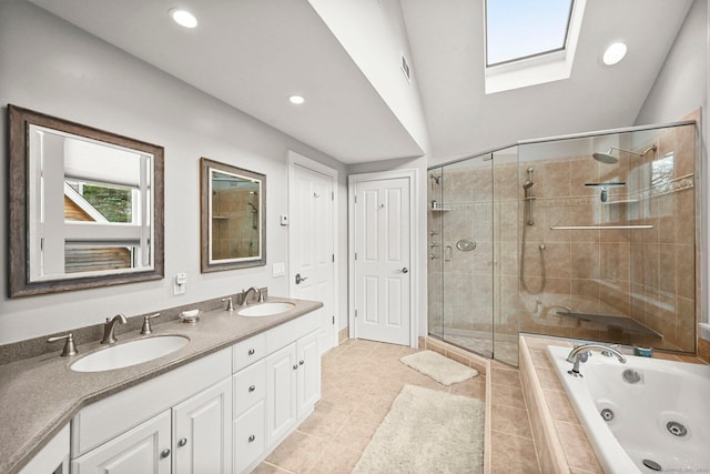 35 Knollcrest Rd, New Fairfield, CT 06812 - bathroom featuring a skylight, a whirlpool tub, a stall shower, double vanity, and recessed lighting